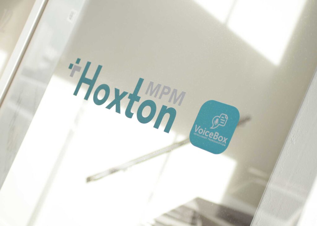 logo for hoxton on the window